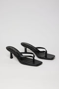 NOIR ESSENCE – Sandalia Mule Tacón Bajo en Negro