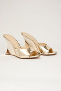 GOLDEN SCULPT – Sandalia Mule Cuña en Dorado Metálico