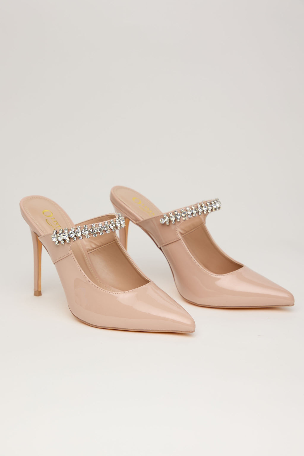 NUDE GLAM – Mule Tacón Alto con Pedrería en Nude Charol